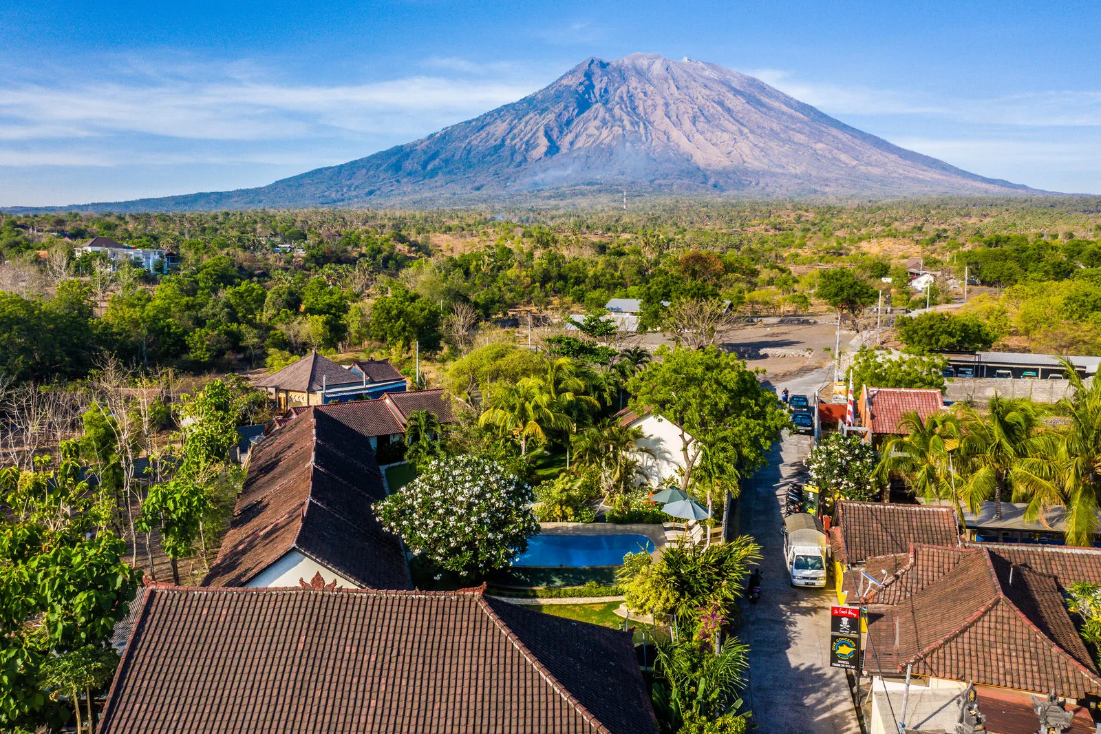 Ocean Sun resort in Tulamben with Mount Agung rising behind the village
